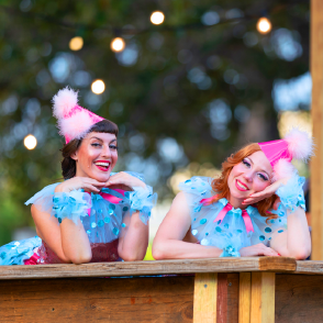 Showgirls in circus costumes in The Pleasure Garden